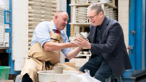 Labour leader Sir Keir Starmer chats with celebrity potter Keith Brymer Jones