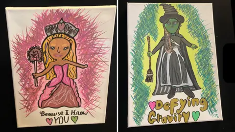 A composite image of two artworks inspired by Wicked. One is of a pink princess with blonde hair (left) while the other is of a green witch wearing a black dress and hat (right).