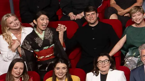 AMPAS Hanna Aqvilin, Shiori Ito, Eric Nyari and Ema Ryan Yamazaki in the 97th Oscars nominees dinner class photo