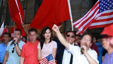 US Department of Justice Ms Sun at a protest against the US visit of Taiwan's president in 2019