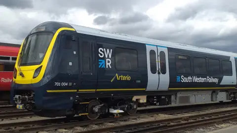 South Western Railway Exterior shot of an Arterio train with South Western Railway branding.