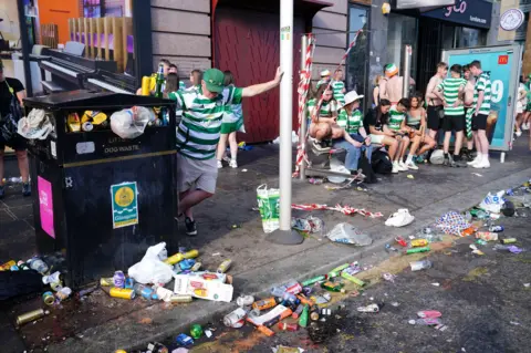 PA Media Bins were overflowing as a result of the celebrations and a considerable amount of rubbish littered the street
