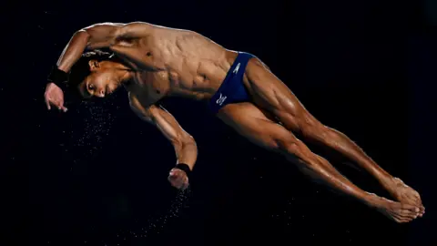 Getty Images Kyle Kothari from Team GB competing in the Men's 10m Platform Final in the Doha 2024 World Aquatics Championships at Hamad Aquatic Centre.