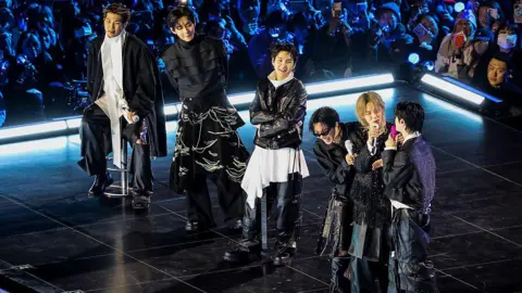 Getty  K-pop boy band BTS perform onstage during comeback concert at Gwanghwamun Square on March 21, 2026 in Seoul, South Korea. The free concert is the band's first performance in nearly four years. 