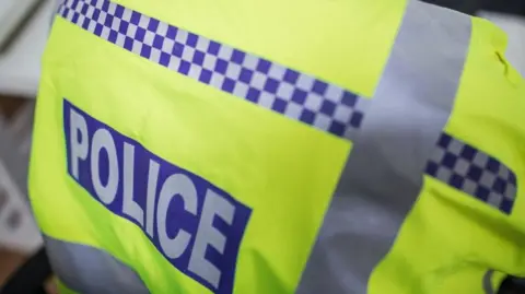 Generic shot of policeman in a hi-vis jacket