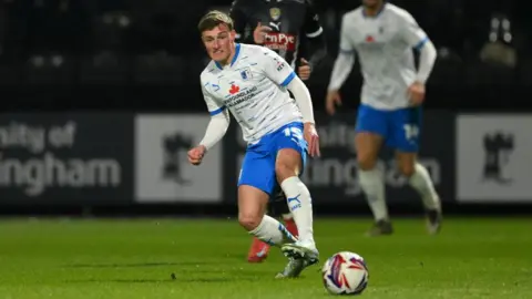 Midfielder Robbie Gotts in action for Barrow 
