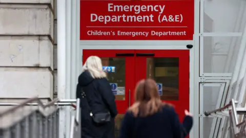 Patients arrive at the Accident and Emergency department (A&E) at a hospital in London, Britain, 08 January 2025.