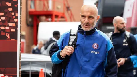 Enzo Maresca arrives at the City Ground with Chelsea