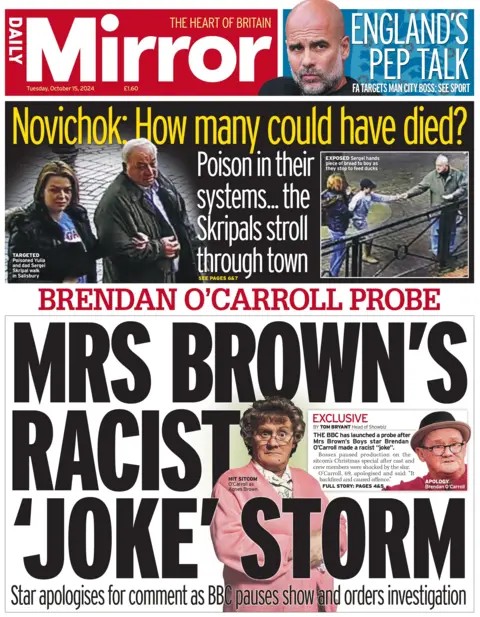 The beforehand   leafage   of the Daily Mirror, which reads "Mrs Brown's racist 'joke' storm". 