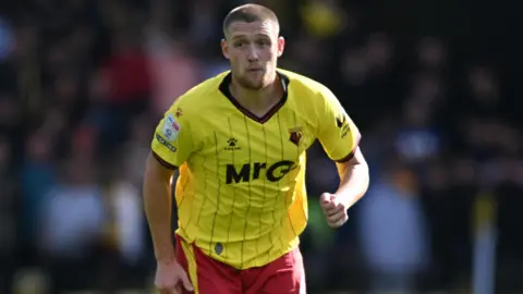 Mattie Pollock in action for Watford 