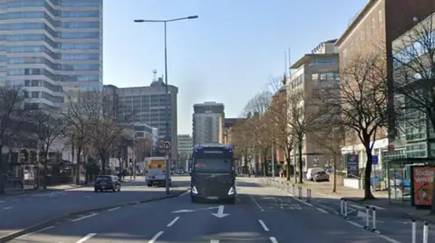 Google A lorry going down the road