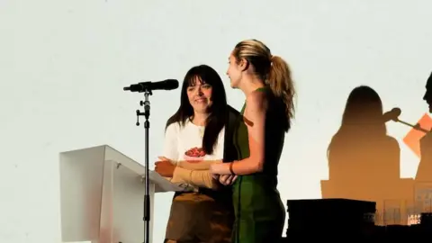 Iaroslava Beth Perkin and Natasha Perkin accepting the Best East Coast Short Film award 