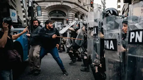 Protesters clash with police in the vicinity of the Argentinian Congress in Buenos Aires