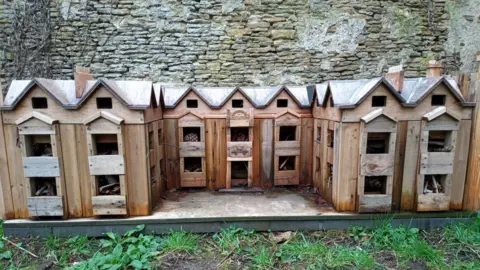 BBC A replica building made out of bits of wood