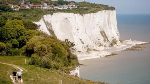 Walkers on the White Cliffs of Dover. 