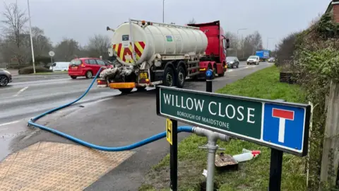 SEW tanker topping up the mains on Ashford Road in Harrietsham, where 500 homes still have no water or low pressure.