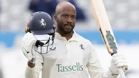 Daniel Bell-Drummond celebrates scoring a century
