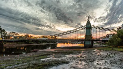 Getty Images A bridge on the Thames at sunrise. 