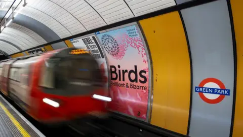 PA Media London Underground train coming in to Green Park station