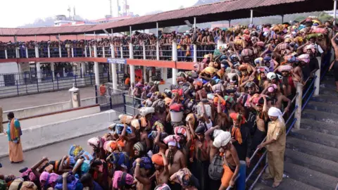 Devotees packed tightly into the steps and corridors of Sabarimala shrine in Kerala