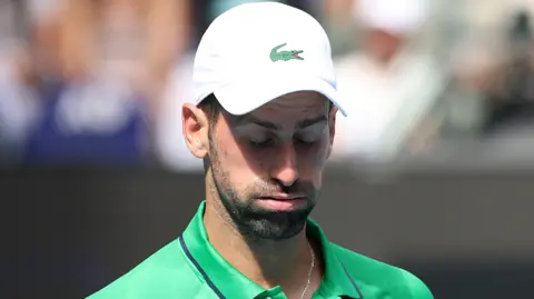 Novak Djokovic exhales