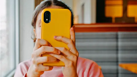 Child with mobile phone