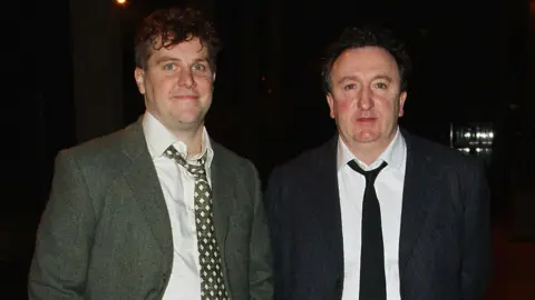 Getty/Phillip Massey/GC Images) DUBLIN, IRELAND - OCTOBER 11: Peter Coonan and Gary Lydon appear on the Saturday Night Show on October 11, 2014 in Dublin, Ireland. (Photo by Phillip Massey/GC Images)