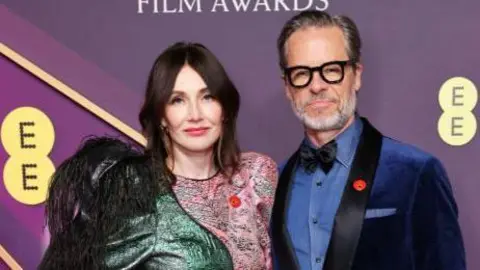 Getty Images The Brutalist's Guy Pearce, up for best supporting actor, attended with Carice van Houten, who appeared in Game of Thrones