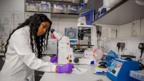 University of Cambridge Ms Bonner working in a lab