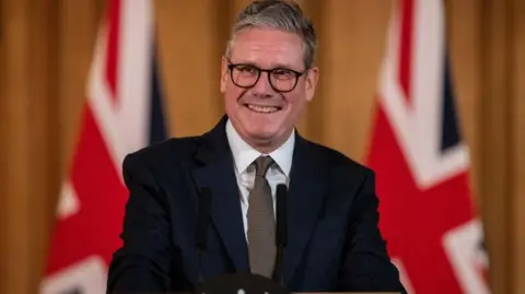 Getty Images Keir Starmer at news conference in Downing Street