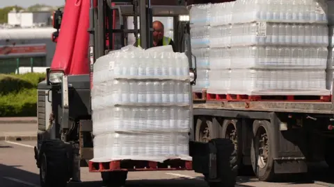 Eddie Mitchell Bottled water station