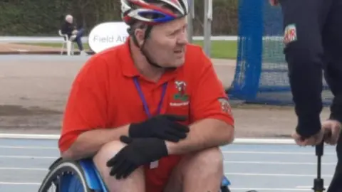 Lee Francis Lee is depicted playing wheelchair basketball at Stoke Mandville Hospital