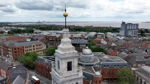 BBC An aerial shot of the tower and the golden Time Ball. The shot shows how the ball would have been visable from the Humber Estuary.