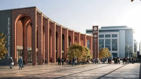An artist's impression of the back entrance of Cardiff Central railway station, including a tall red brick arch along the back of the building. On the left hand side of the building a grey sign reads: Caerdydd Canolog Cardiff Central. Trees can be seen dotted on the courtyard entrance, and people can see seen walking in crowds outside the building. The British Gas building can be seen in the background.