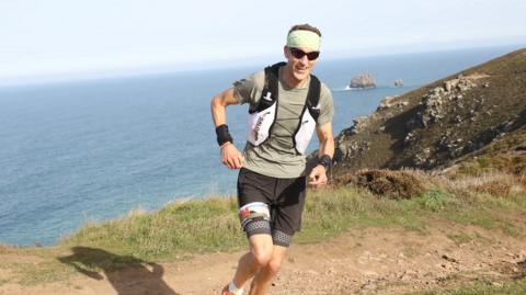 Martin Higgins along the coast running