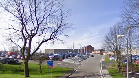 Google HMP Lowdham Grange is pictured with cars parked in a car park