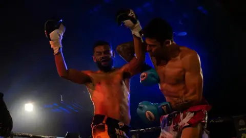 jt_jrsy_photography Two men fighting 