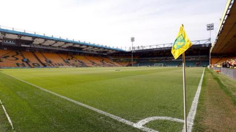 Corner flag and empty seats inside Norwich City's football ground