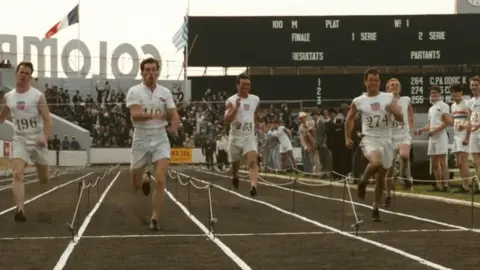 Chariots of Fire/Enigma Production/Hugh Hudson Sprinters run in line in scene from Chariots of Fire