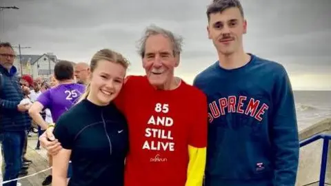 Porthcawl Parkrun Eric with his grandchildren Willow and Jack