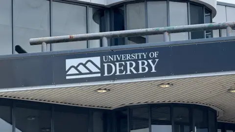 A sign outside the University of Derby's main campus on Kedleston Road