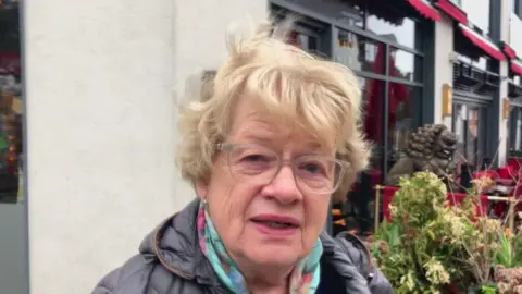 Pat in Guildford looks straight at the camera.