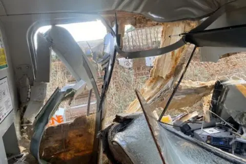 RAIB The badly-damaged interior of a train cabin caused by hitting a fallen tree at high-speed