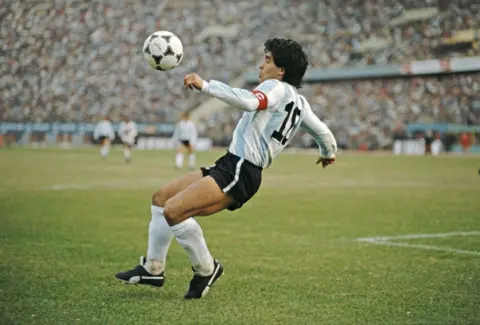 Getty Images Maradona mid-play during the 1986 world cup (1986 FIFA World Cup qualifying match against Peru at the National Stadium on June 23)
