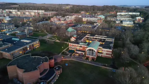 Getty Images An aerial photo of the University of Sussex campus at dusk in winter