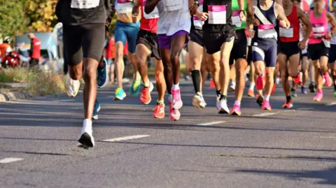 People running in a marathon