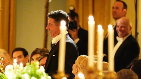 PA Media Rory McIlroy stands to take a bow