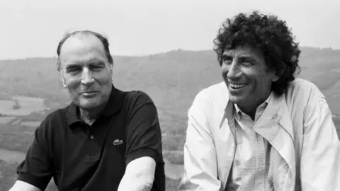 AFP via Getty Images François Mitterrand and Jack Lang during a country walk in 1982