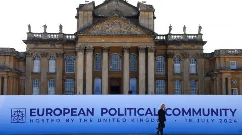 Reuters A general view of Blenheim Palace, with a banner saying "European Political Community, hosted by the United Kingdom, 18 July 2024"