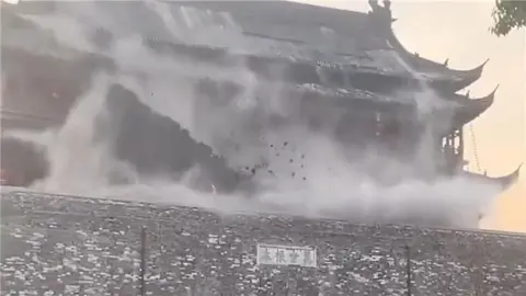Screengrab of the roof collapsing in China